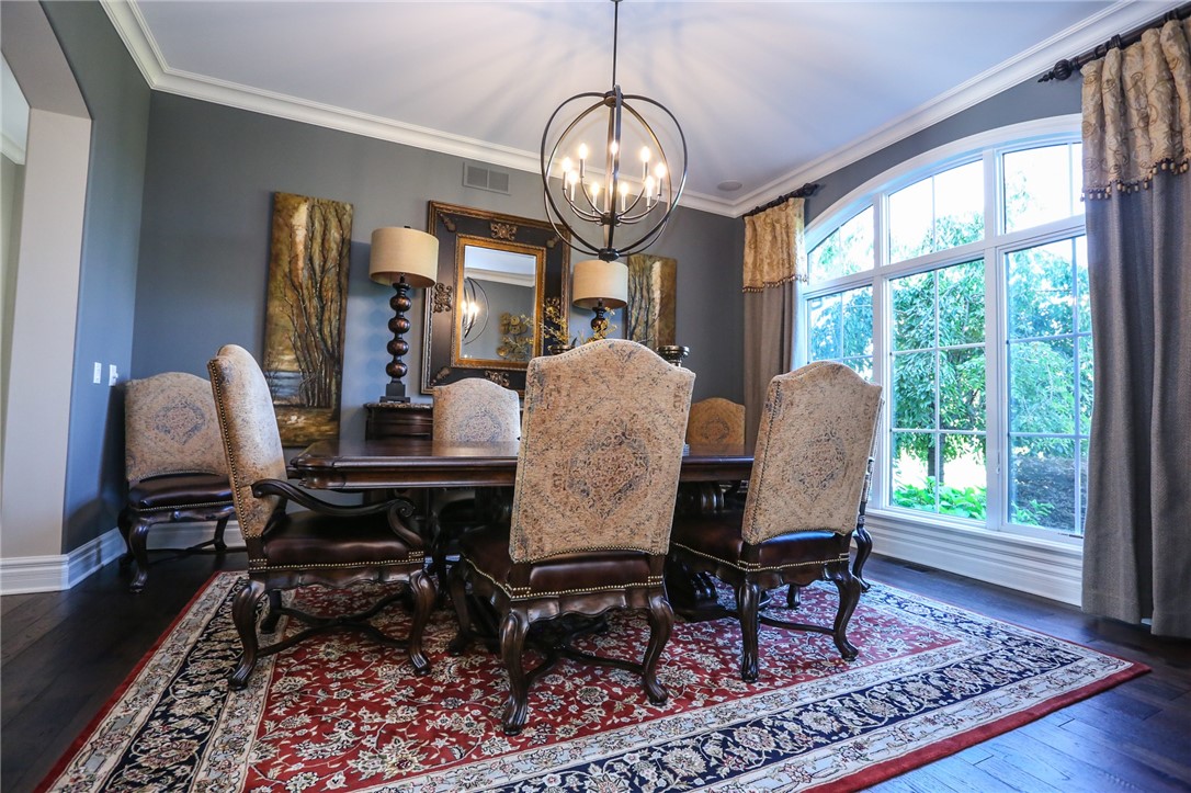 160 Goshawk Drive Victor, NY 14564 - Photo 7 of 50 FORMAL DINING ROOM OFF THE MAIN FOYER WITH TRIPLE