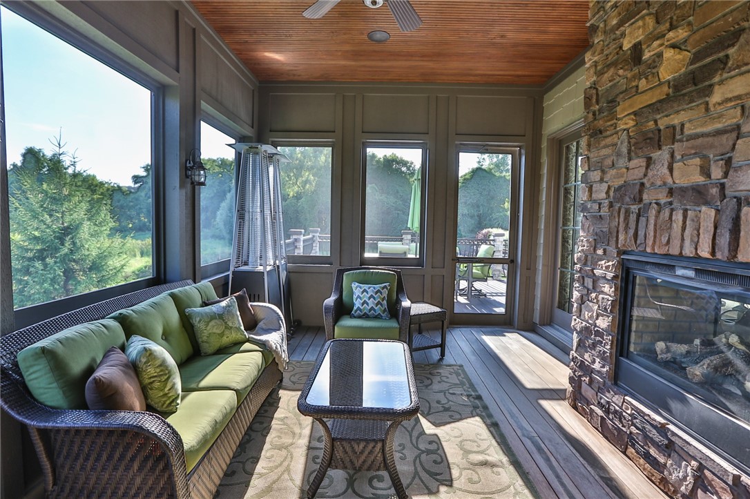 160 Goshawk Drive Victor, NY 14564 - Photo 10 of 50 ALTERNATE VIEW OF THE SCREENED PORCH ENTERING FROM