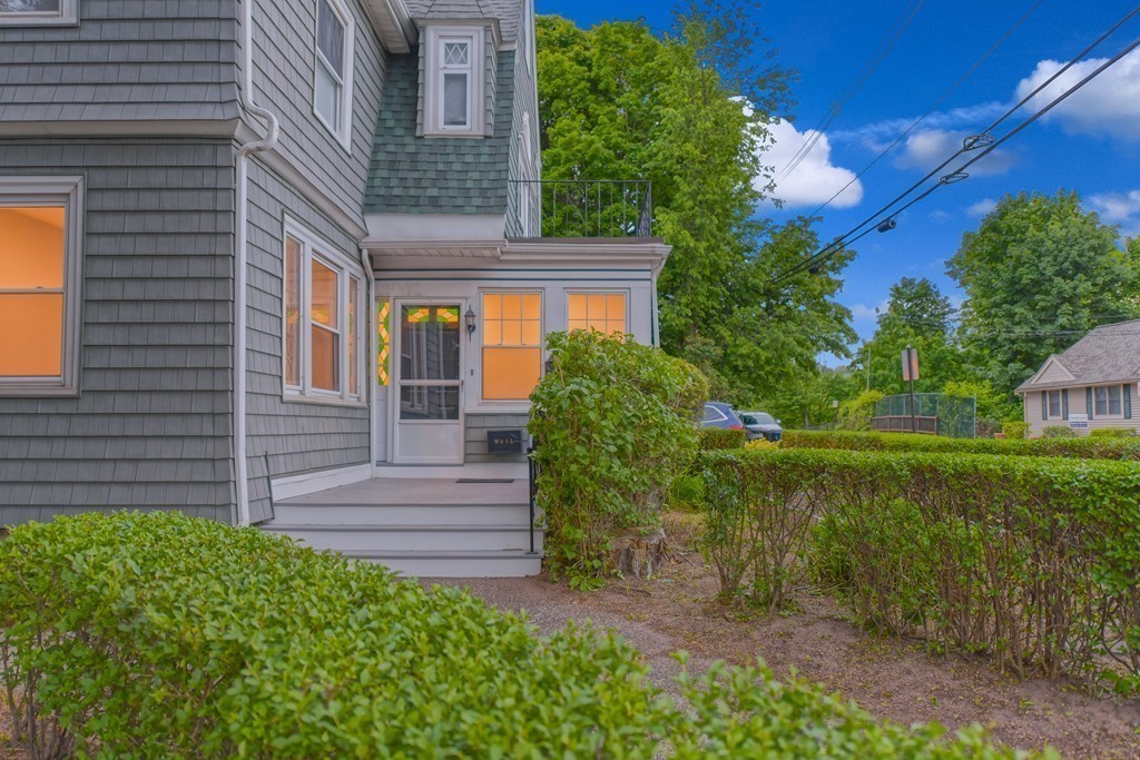 232 Aspinwall Avenue, Unit 1 Brookline, MA 02445 - Photo 1 of 13 a view of a house with a yard