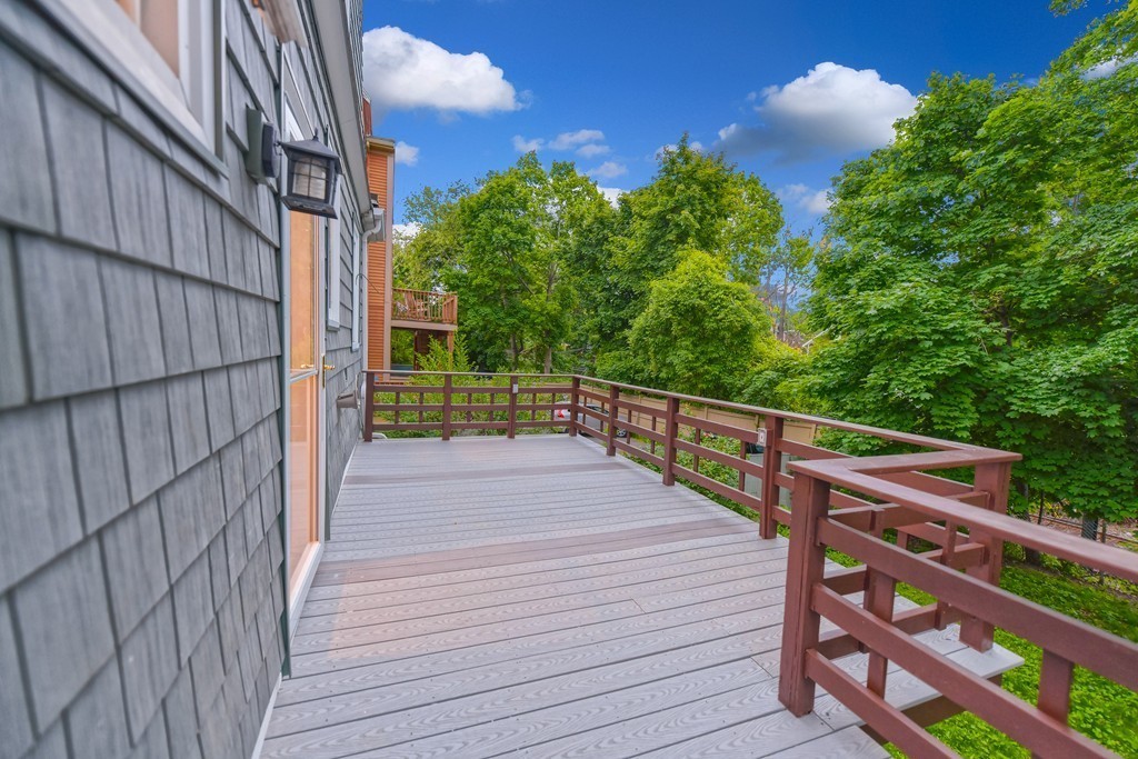 232 Aspinwall Avenue, Unit 1 Brookline, MA 02445 - Photo 12 of 13 a view of a balcony with wooden floor