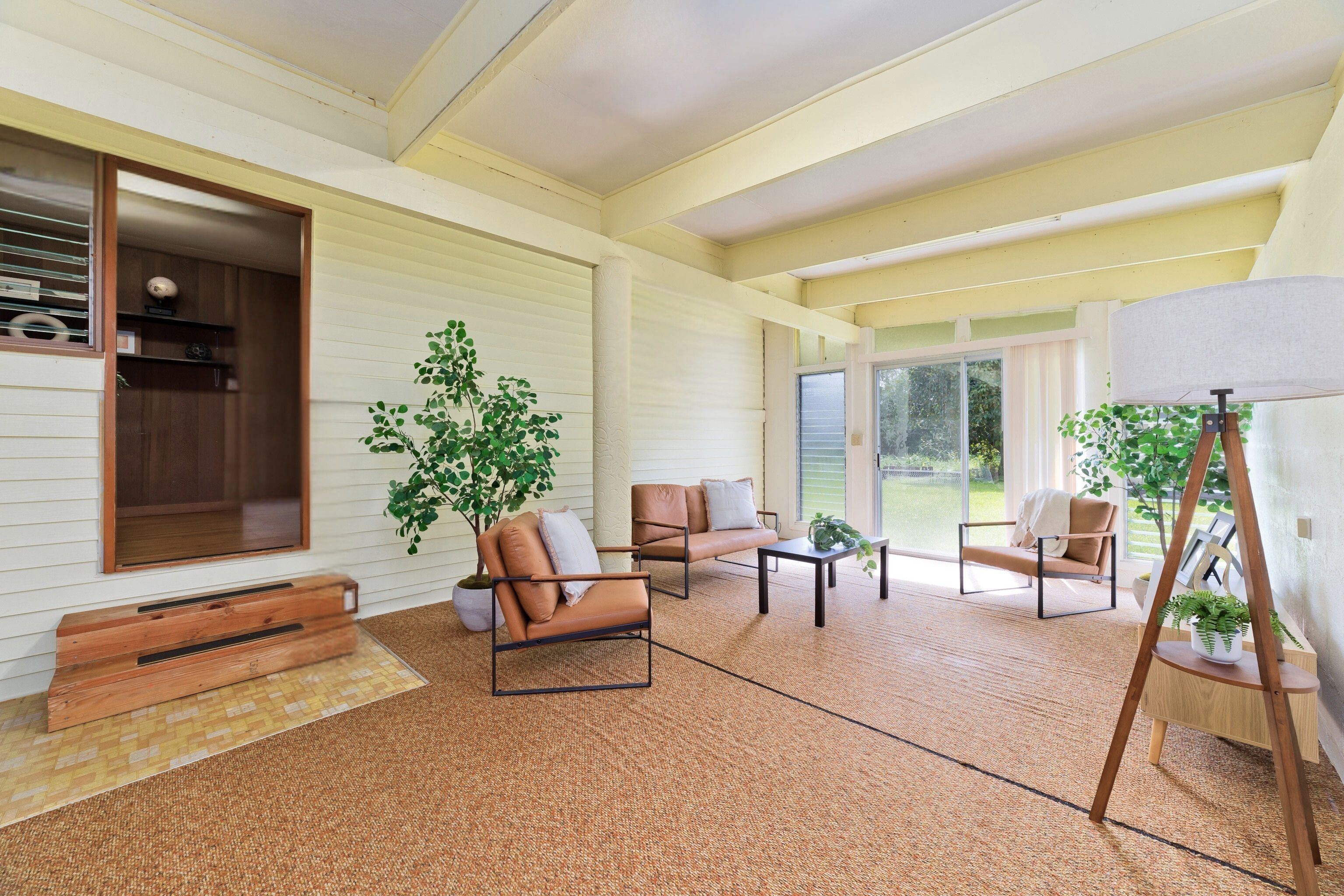 25 Wawai Loop Hilo, HI 96720 - Photo 14 of 22 a living room with furniture and a potted plant