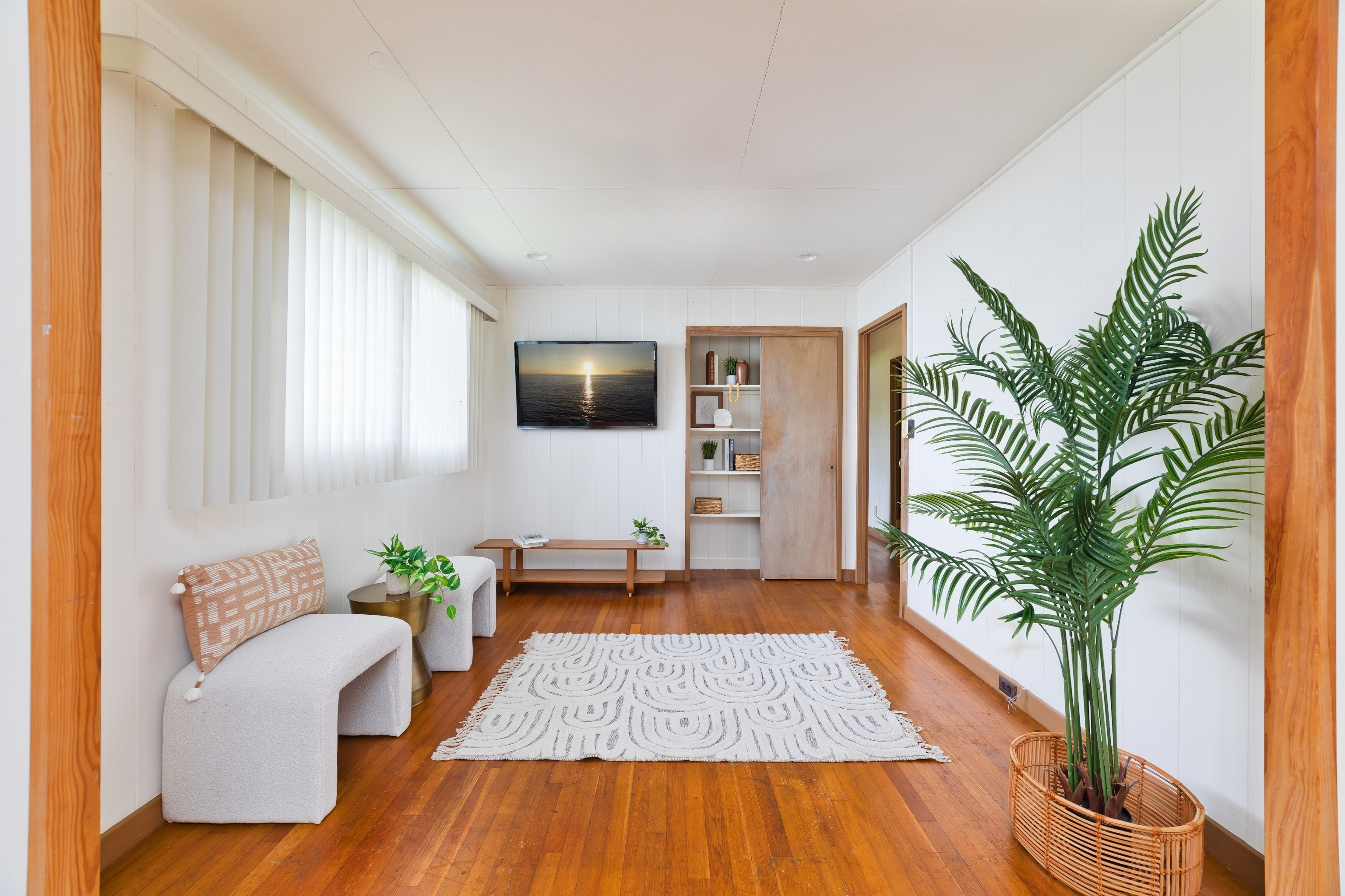 25 Wawai Loop Hilo, HI 96720 - Photo 3 of 22 a living room with furniture and a flat screen tv