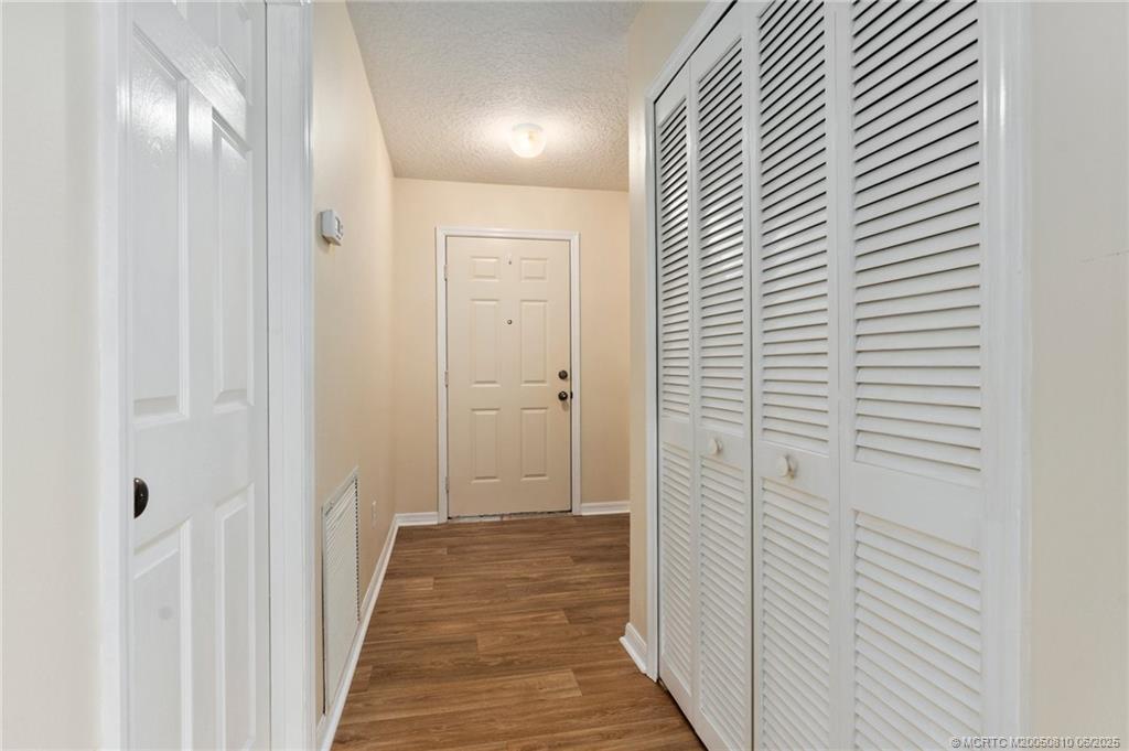 542 Woods Edge Trail Stuart, FL 34997 - Photo 15 of 31 a view of a hallway