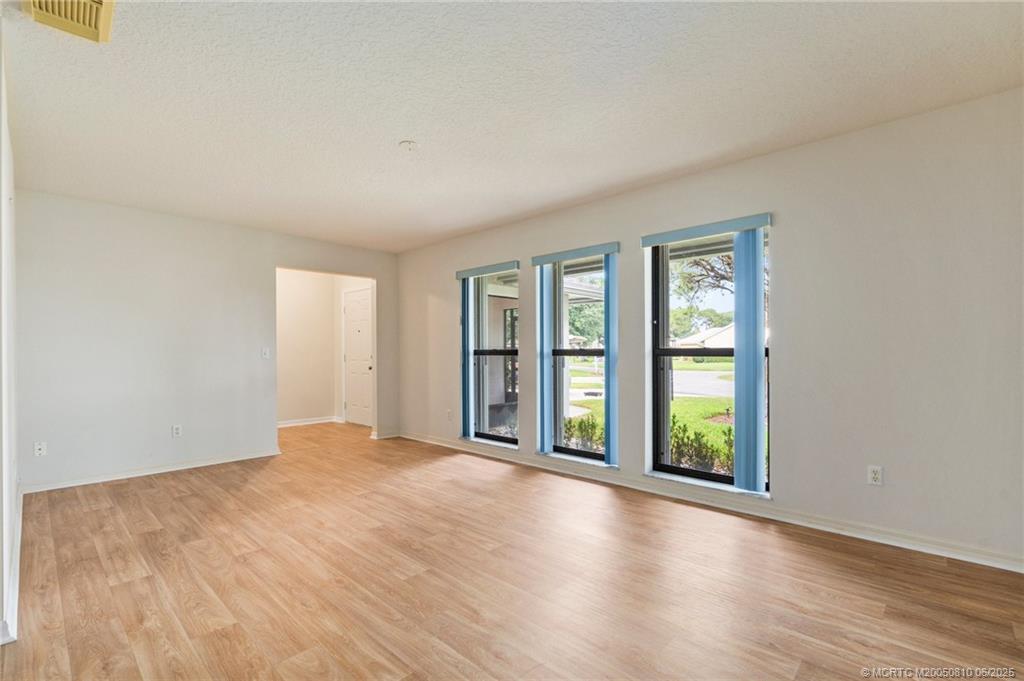 542 Woods Edge Trail Stuart, FL 34997 - Photo 4 of 31 an empty room with windows