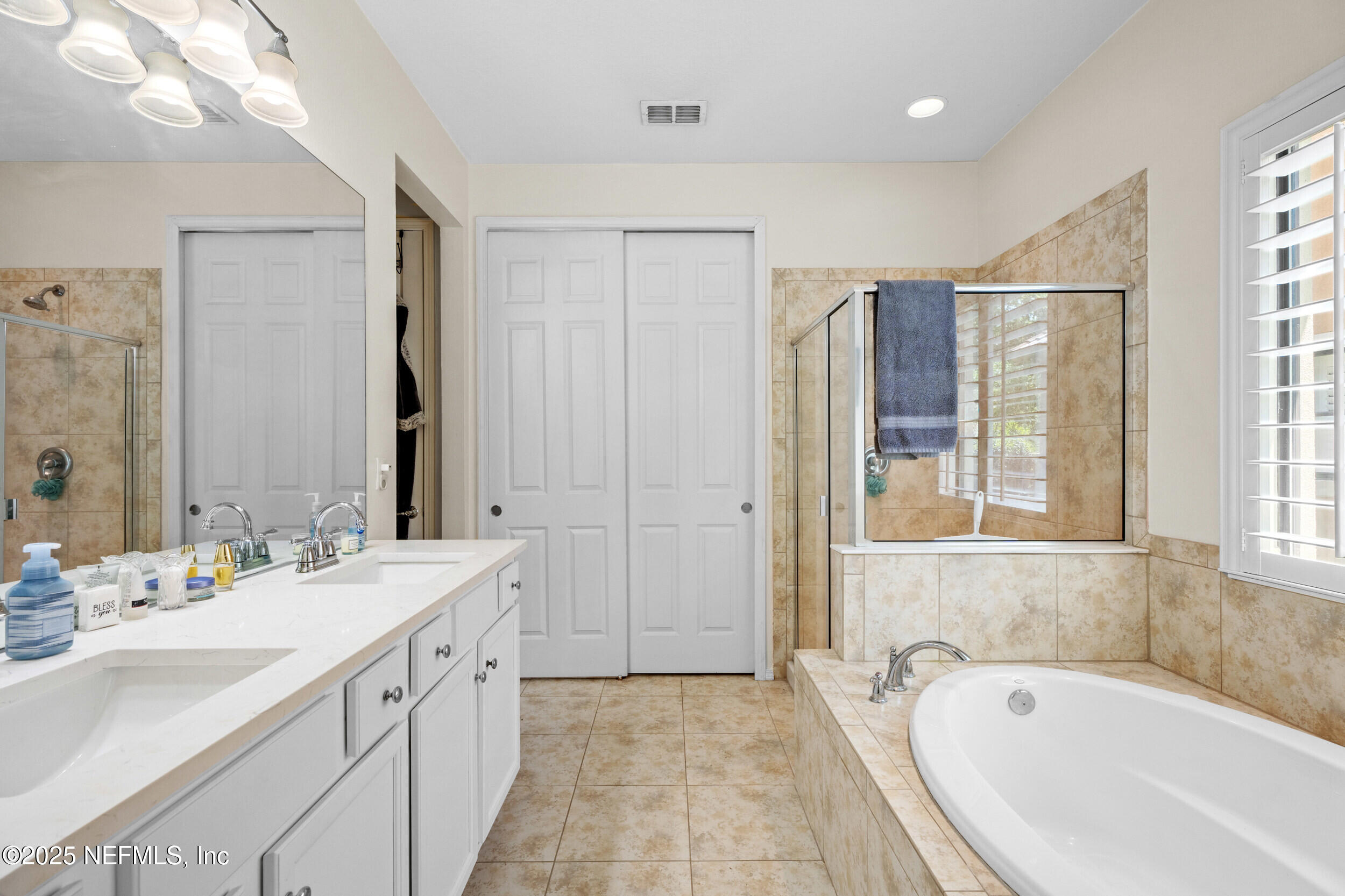113 Marsh Hollow Road Ponte Vedra, FL 32081 - Photo 29 of 102 Master Bathroom with White Cabinetry