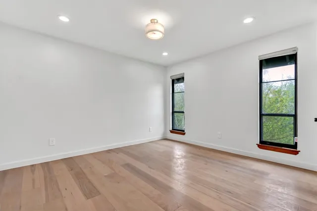 an empty room with windows