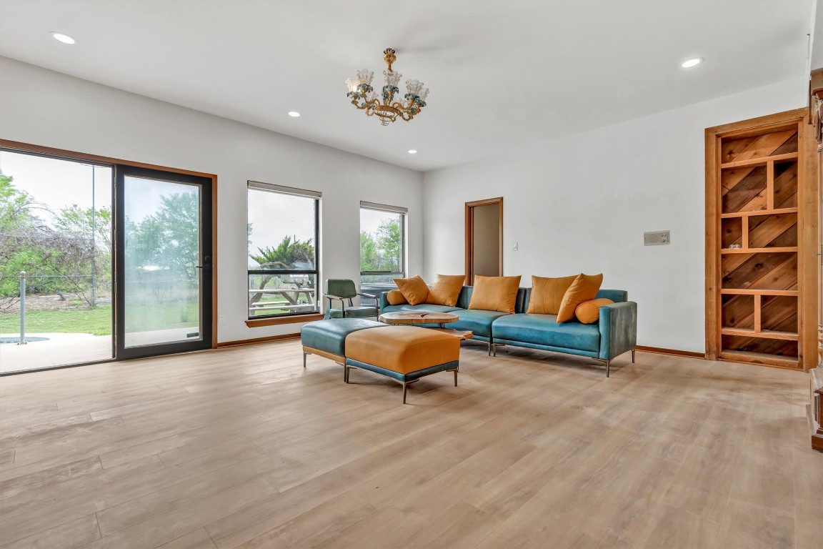 1201 County Road 138 Hutto, TX 78634 - Photo 3 of 26 a living room with furniture and a large window