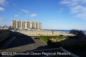 a view of balcony with furniture