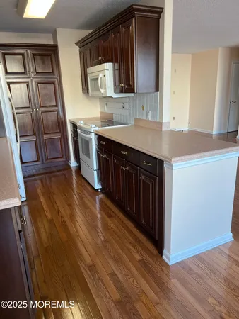 a bathroom with a sink a mirror and vanity