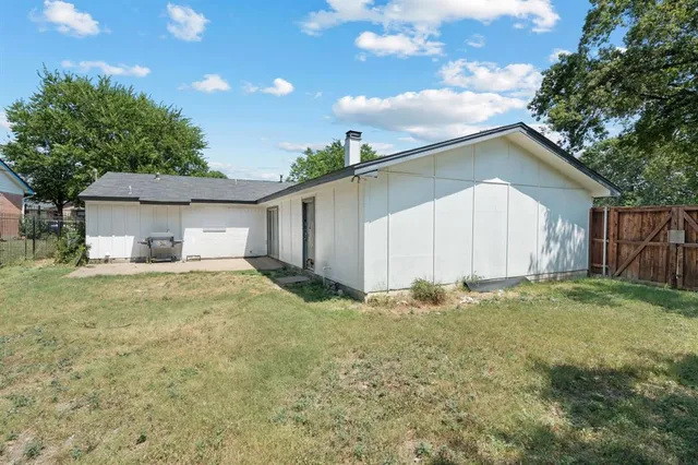 a bathroom with a sink and a yard