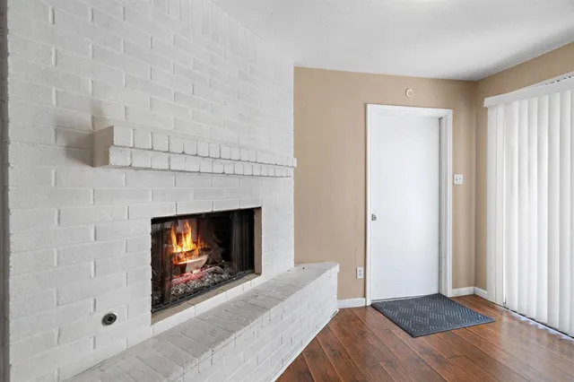 a living room with a fireplace