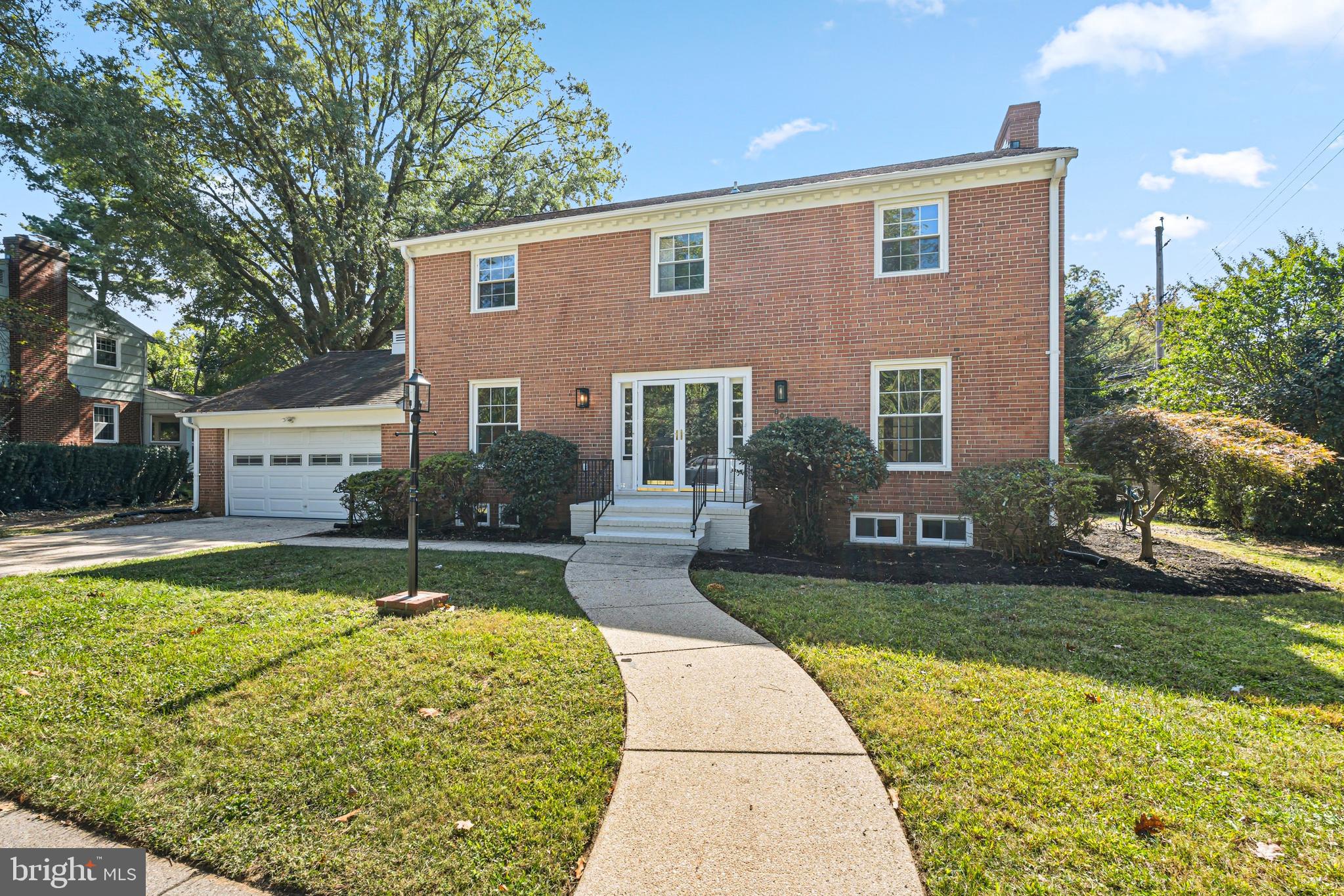 803 Stoneleigh Road Baltimore, MD 21212 - Photo 1 of 56 a front view of a house with garden