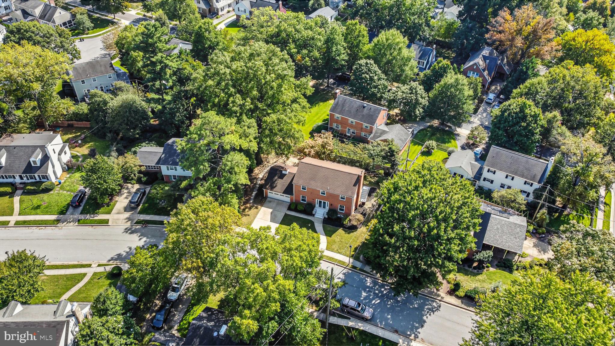 803 Stoneleigh Road Baltimore, MD 21212 - Photo 5 of 56 an aerial view of a house with a yard and garden