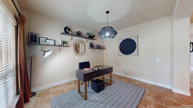 a view of dining room and wooden floor