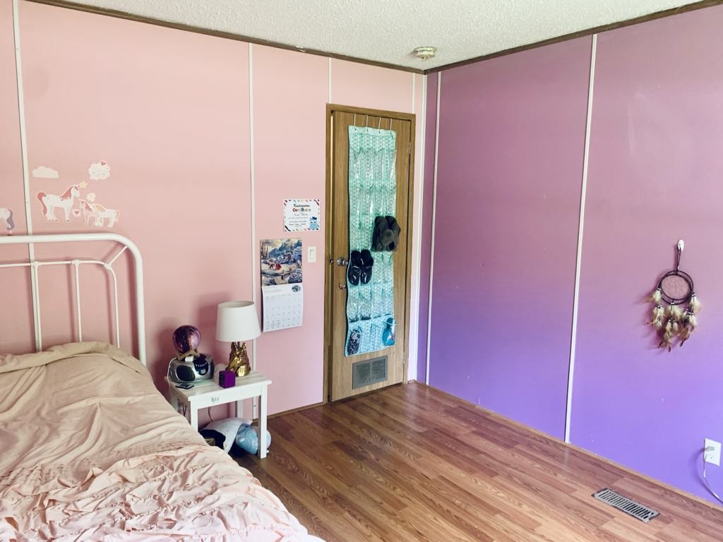 8603 Crawley Hill Rd Mount Mount Pleasant, TN 38474 - Photo 7 of 12 a bedroom with a bed and a window