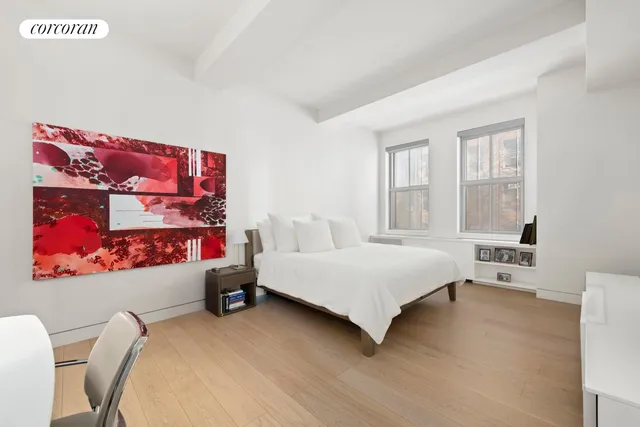 a living room with furniture and windows