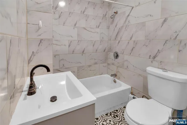 a bathroom with a sink and a toilet