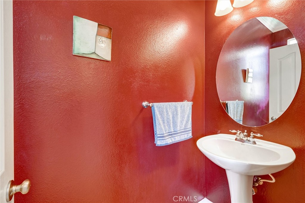 1159 Elfin Forest Road San Marcos, CA 92078 - Photo 13 of 40 a bathroom with a sink and a mirror