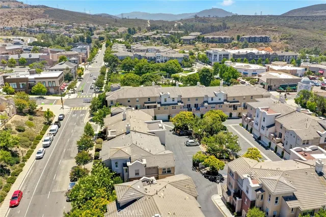 an aerial view of a city with lots of residential buildings