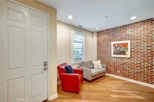 a spacious bedroom with a bed and a couch