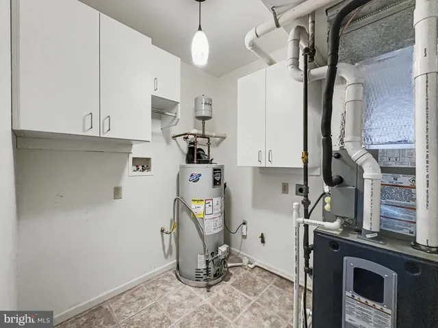 a view of appliances and cabinets