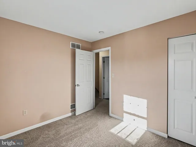 an empty room with a door