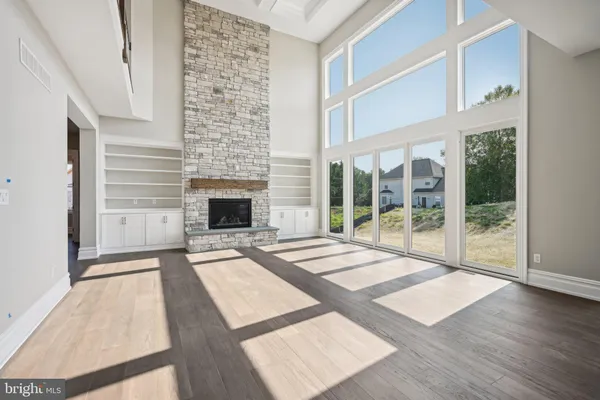 a open kitchen with stainless steel appliances granite countertop a stove and cabinets