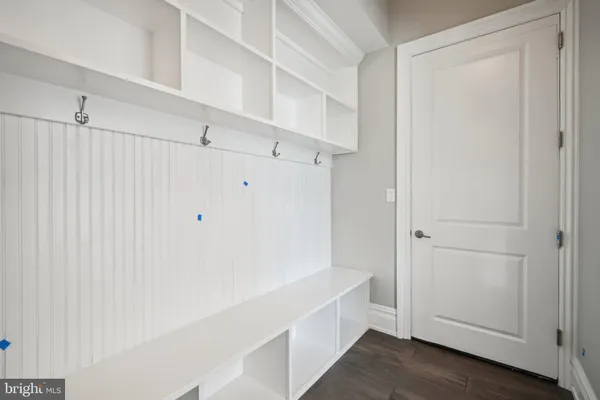 a view of a room with racks on the wall