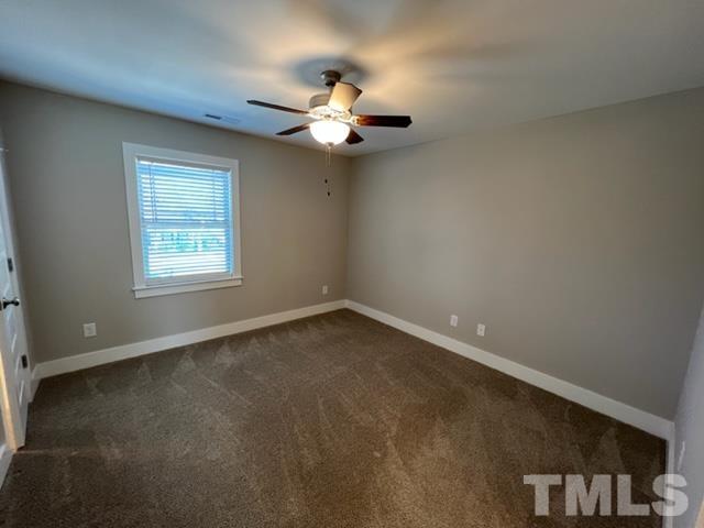 355 South Church Street Coats, NC 27521 - Photo 14 of 17 an empty room with a window