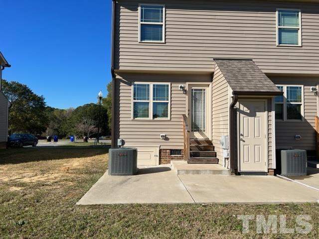 355 South Church Street Coats, NC 27521 - Photo 16 of 17 a front view of a house with garden