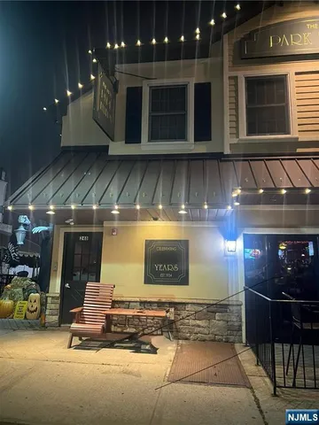 a view of a garage with cars