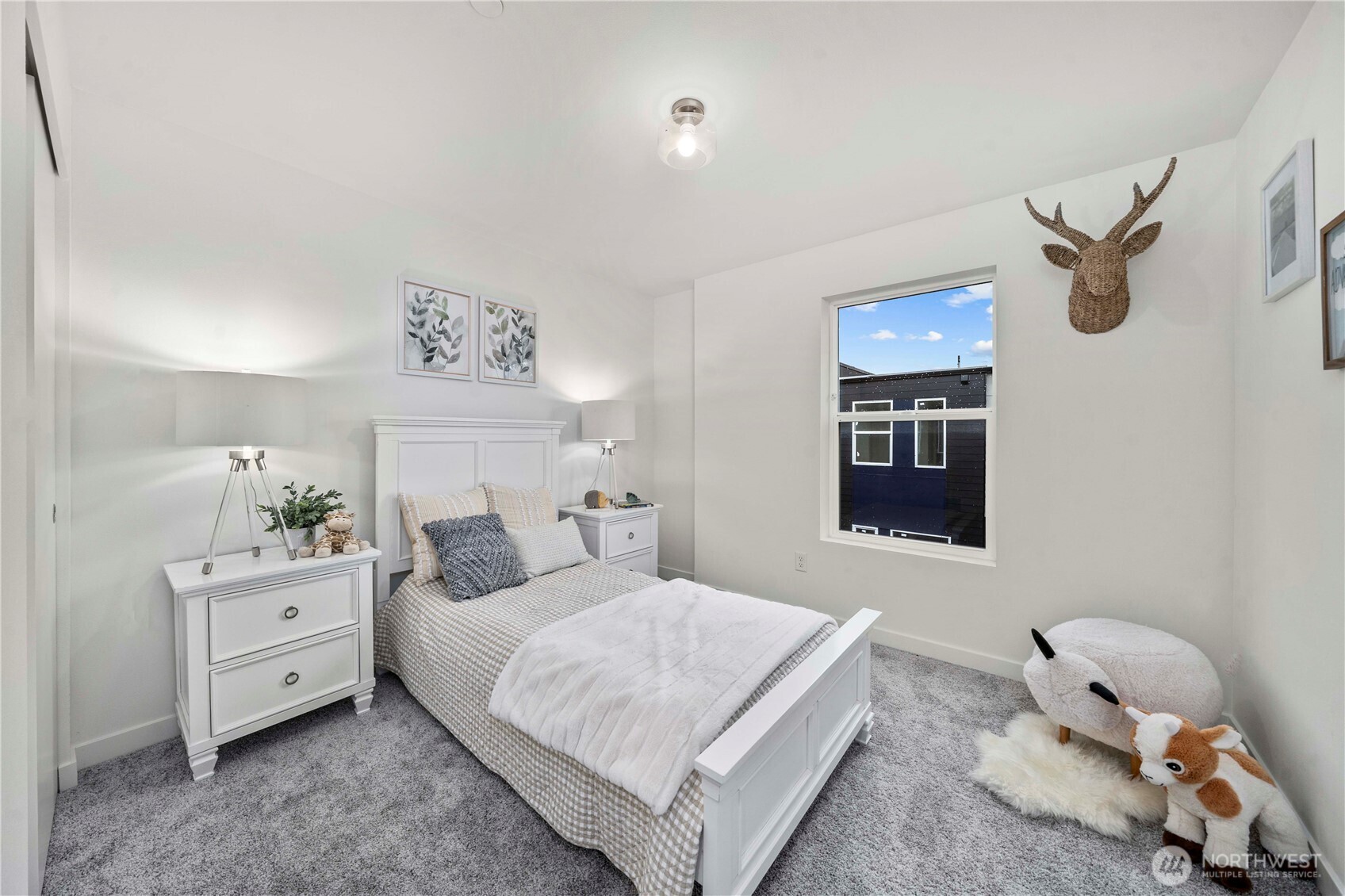 11535 17th Place Southwest Burien, WA 98146 - Photo 22 of 40 a bedroom with a bed and a window