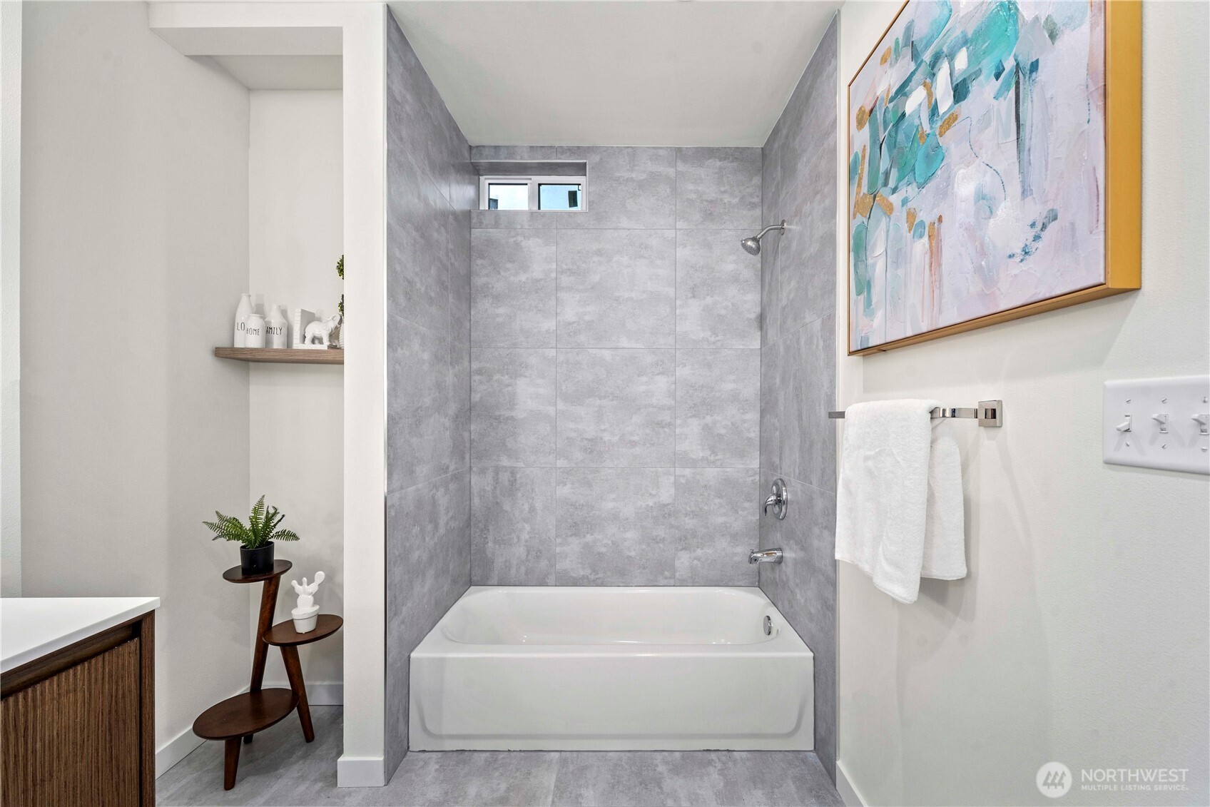 11535 17th Place Southwest Burien, WA 98146 - Photo 27 of 40 a bathroom with a bathtub and a shower