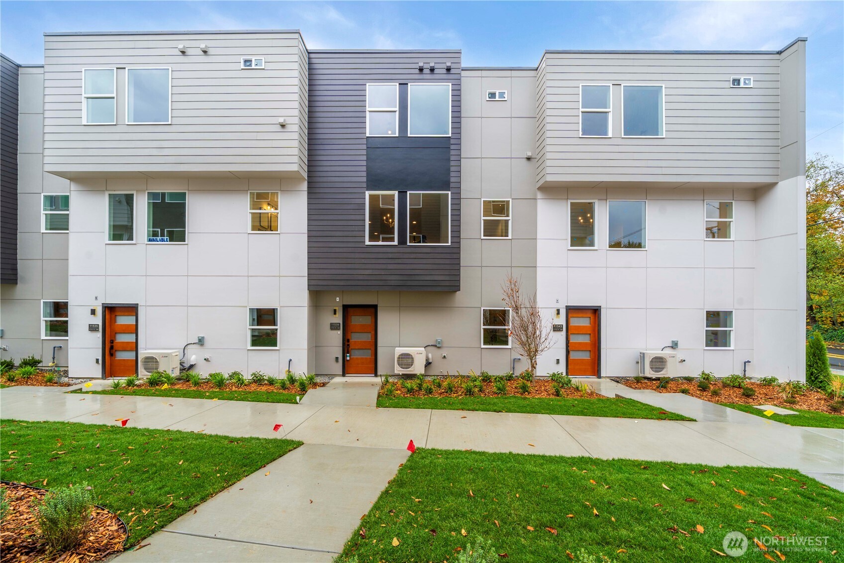 11535 17th Place Southwest Burien, WA 98146 - Photo 34 of 40 a front view of a house with a yard and garage