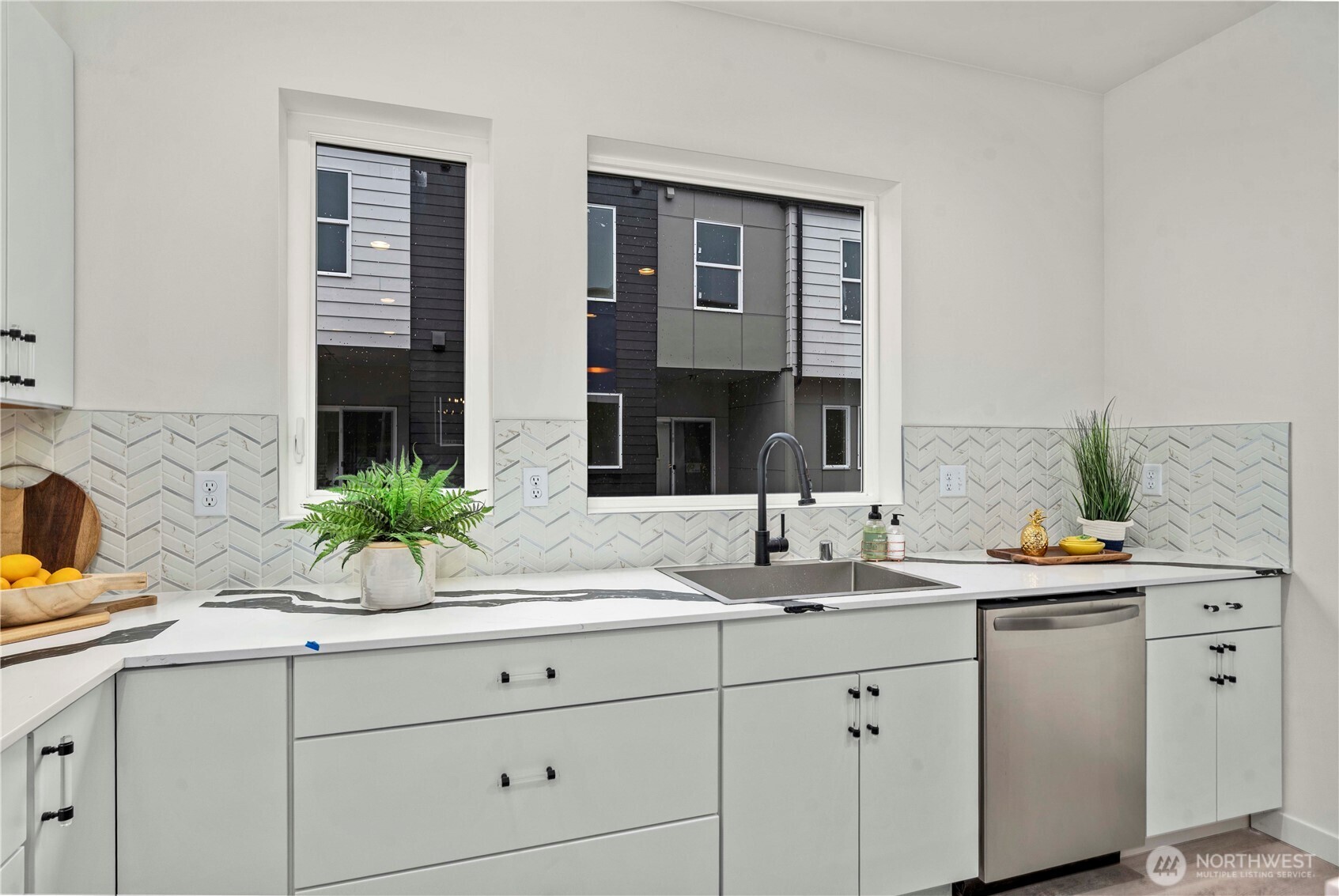11535 17th Place Southwest Burien, WA 98146 - Photo 7 of 40 a bathroom with a sink double vanity and a mirror