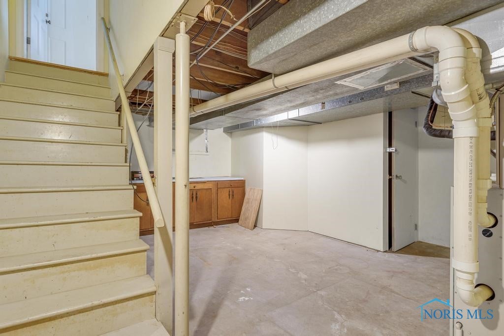 3432 Corey Road Toledo, OH 43615 - Photo 37 of 38 Workspace in half of basement
