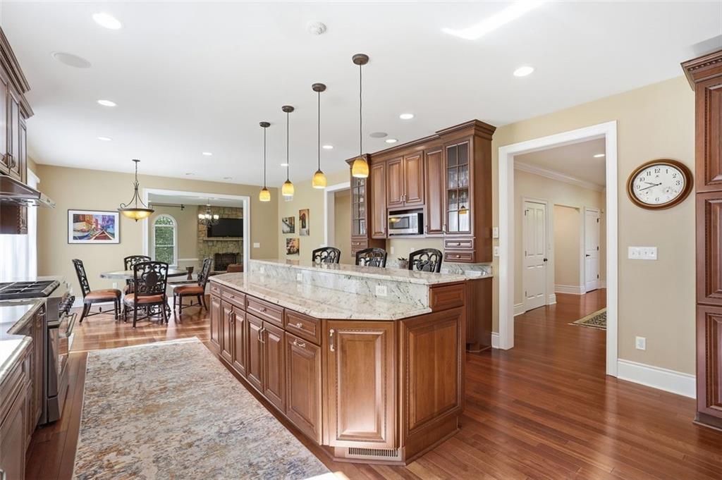 1040 Chanticleer Drive Crescent, PA 15046 - Photo 11 of 50 a large kitchen with kitchen island a large island in it