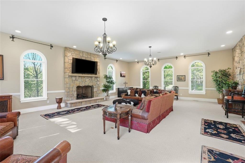 1040 Chanticleer Drive Crescent, PA 15046 - Photo 16 of 50 a living room with furniture fireplace and a large window