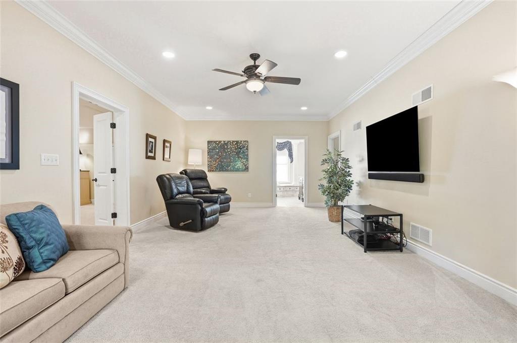 1040 Chanticleer Drive Crescent, PA 15046 - Photo 20 of 50 a living room with furniture and a flat screen tv