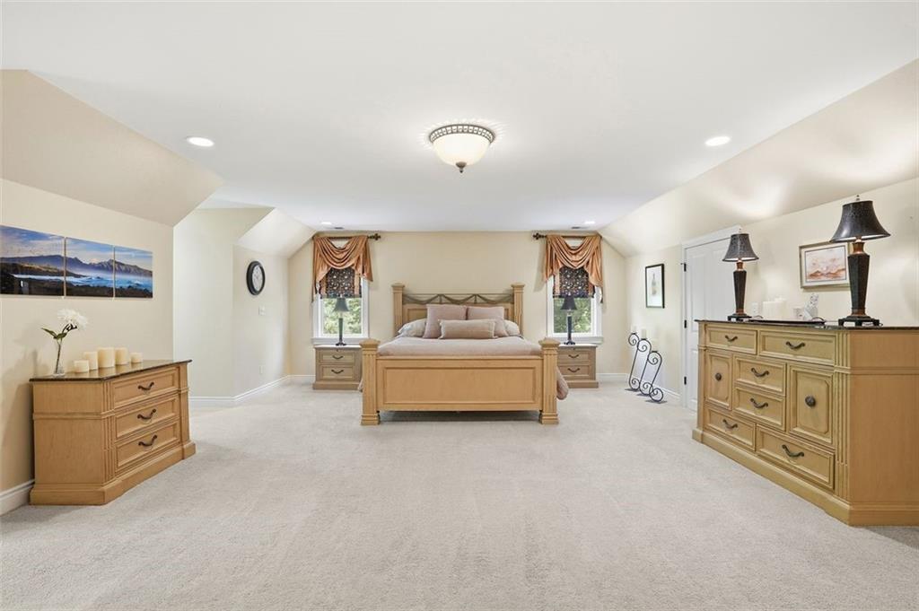 1040 Chanticleer Drive Crescent, PA 15046 - Photo 21 of 50 a spacious bedroom with a bed and a cabinets