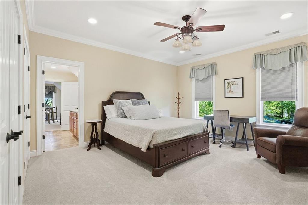 1040 Chanticleer Drive Crescent, PA 15046 - Photo 28 of 50 a bedroom with a bed and a chandelier
