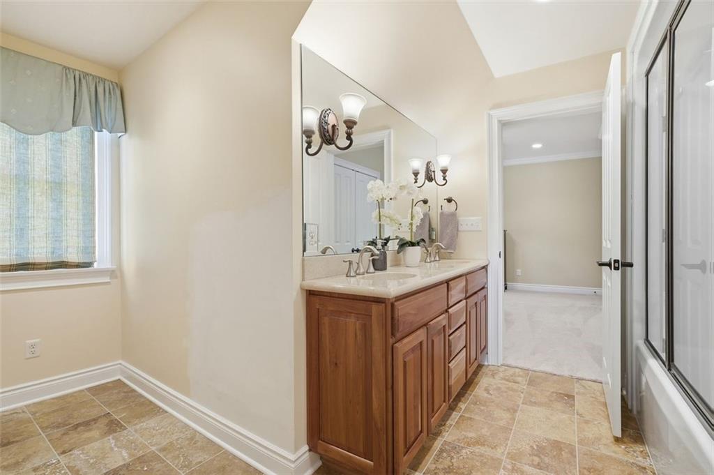 1040 Chanticleer Drive Crescent, PA 15046 - Photo 29 of 50 a bathroom with a sink a mirror and a shower