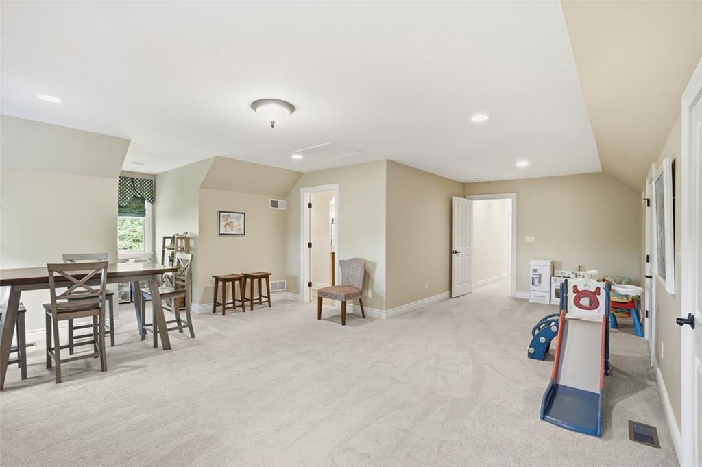 1040 Chanticleer Drive Crescent, PA 15046 - Photo 30 of 50 a view of a livingroom with furniture and a gym machine