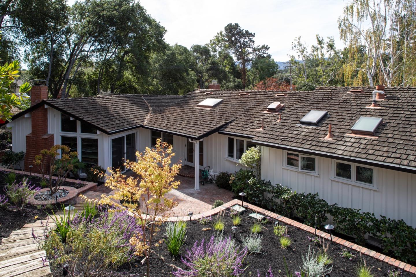 10490 Florence Drive Cupertino, CA 95014 - Photo 1 of 17 a backyard of a house with lots of green space