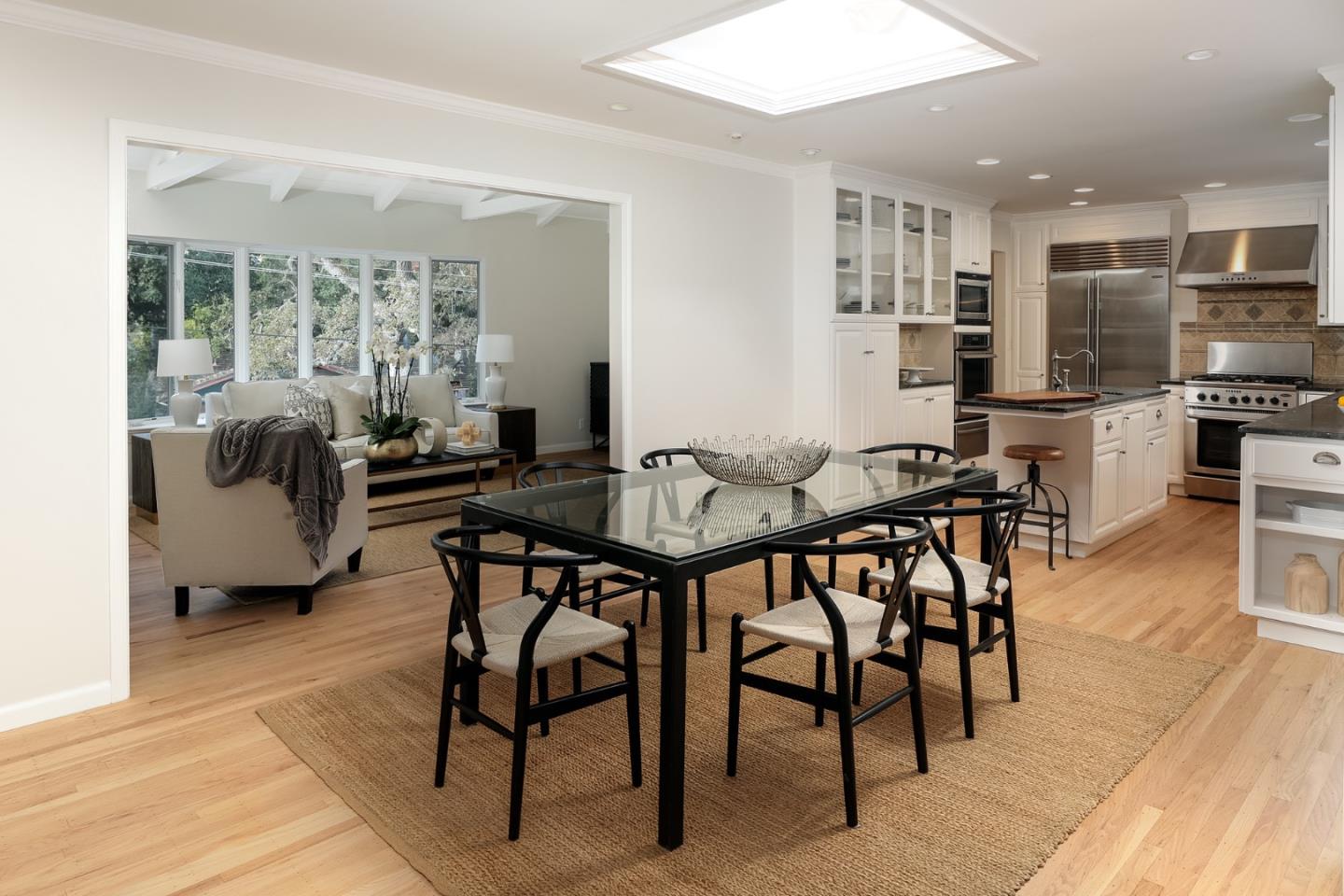 10490 Florence Drive Cupertino, CA 95014 - Photo 7 of 17 a view of a dining room with furniture and wooden floor