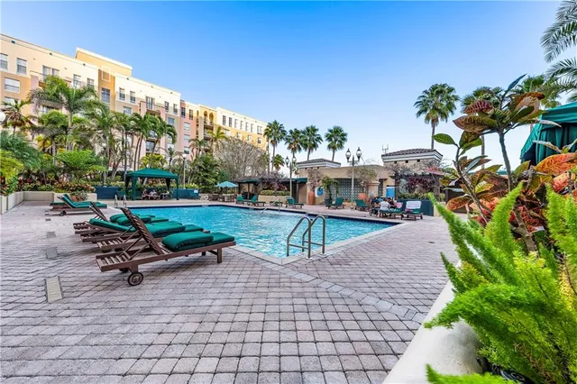 a room with gym equipment and a table