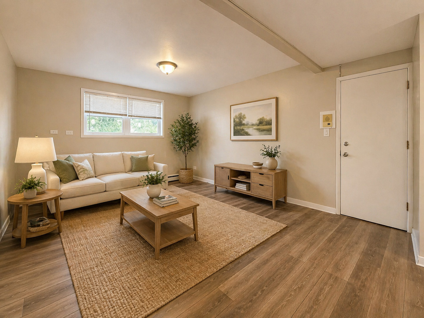 108 North McAree Road, Unit BD Waukegan, IL 60085 - Photo 2 of 4 a living room with furniture and a wooden floor