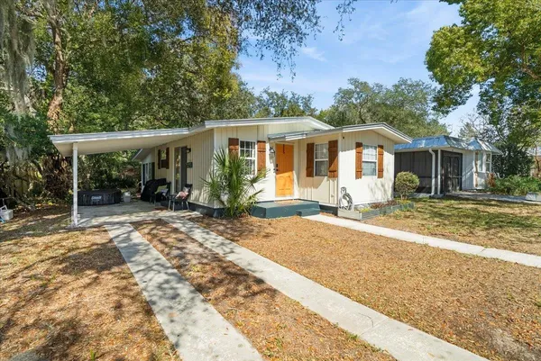 front view of a house with a yard