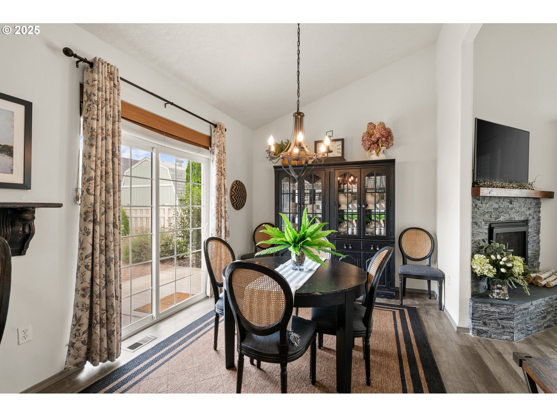1822 Southwest 3rd Street Pendleton, OR 97801 - Photo 13 of 34 a dining room with furniture a chandelier and wooden floor
