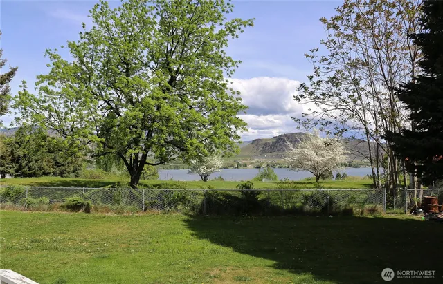 a view of a garden with a lake